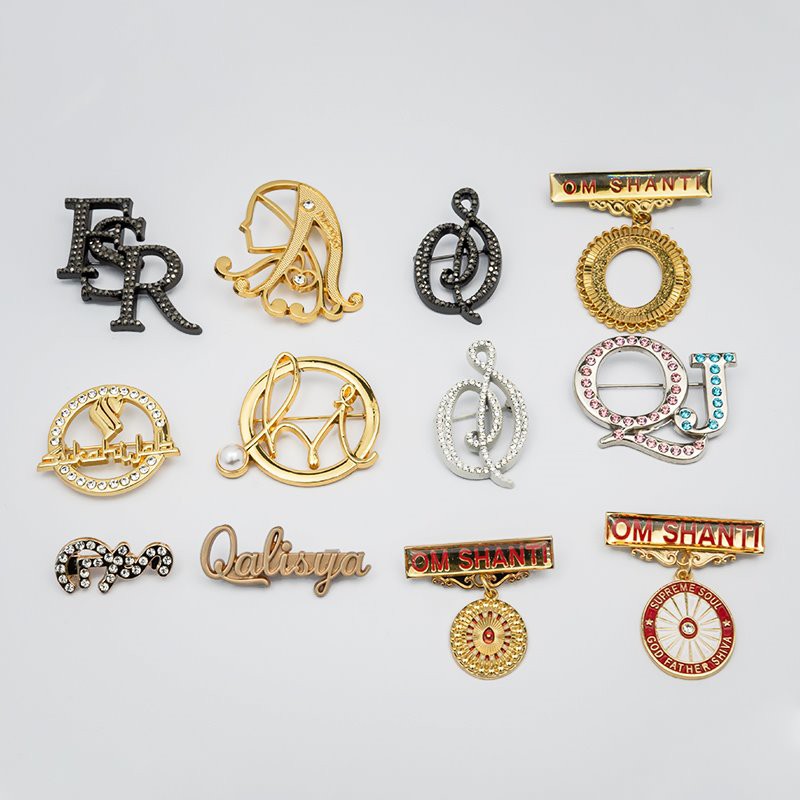 designer brooches and pins