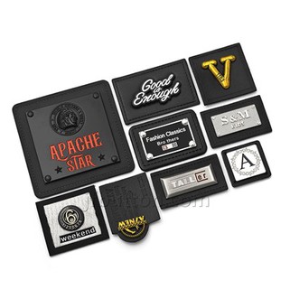 Patch de cuero negro con logotipo de metal