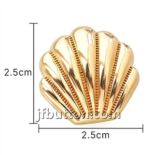 Botones en forma de concha dorada