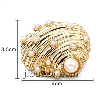 Botones de metal con forma de concha